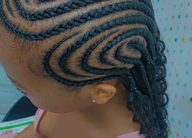 Intricate braid design showcased at Luxe Beau, Cape Town, Western Cape, ZA, offering unique hair styling.
