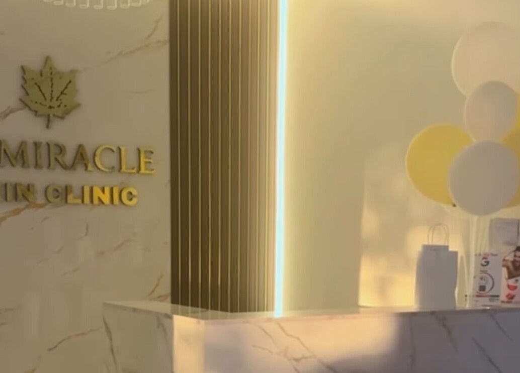 Reception area of Le Miracle Skin Clinic in Ottawa, Ontario, CA, featuring a modern design with balloons.