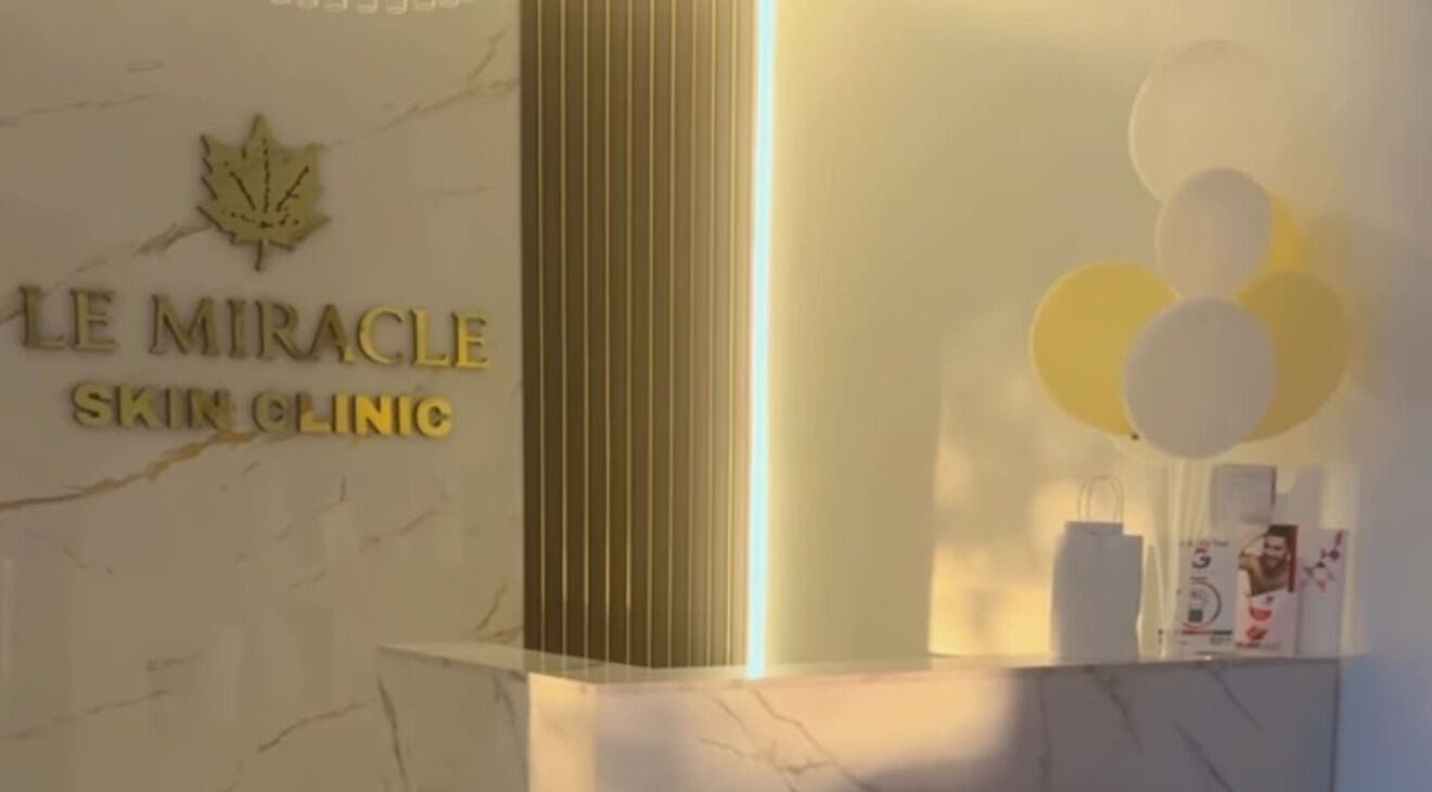 Reception area of Le Miracle Skin Clinic in Ottawa, Ontario, CA, featuring a modern design with balloons.