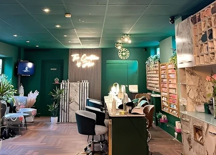 Stylish interior of Pinks Beauty & Spa, Hitchin, England, GB. Cozy seating and elegant decor.