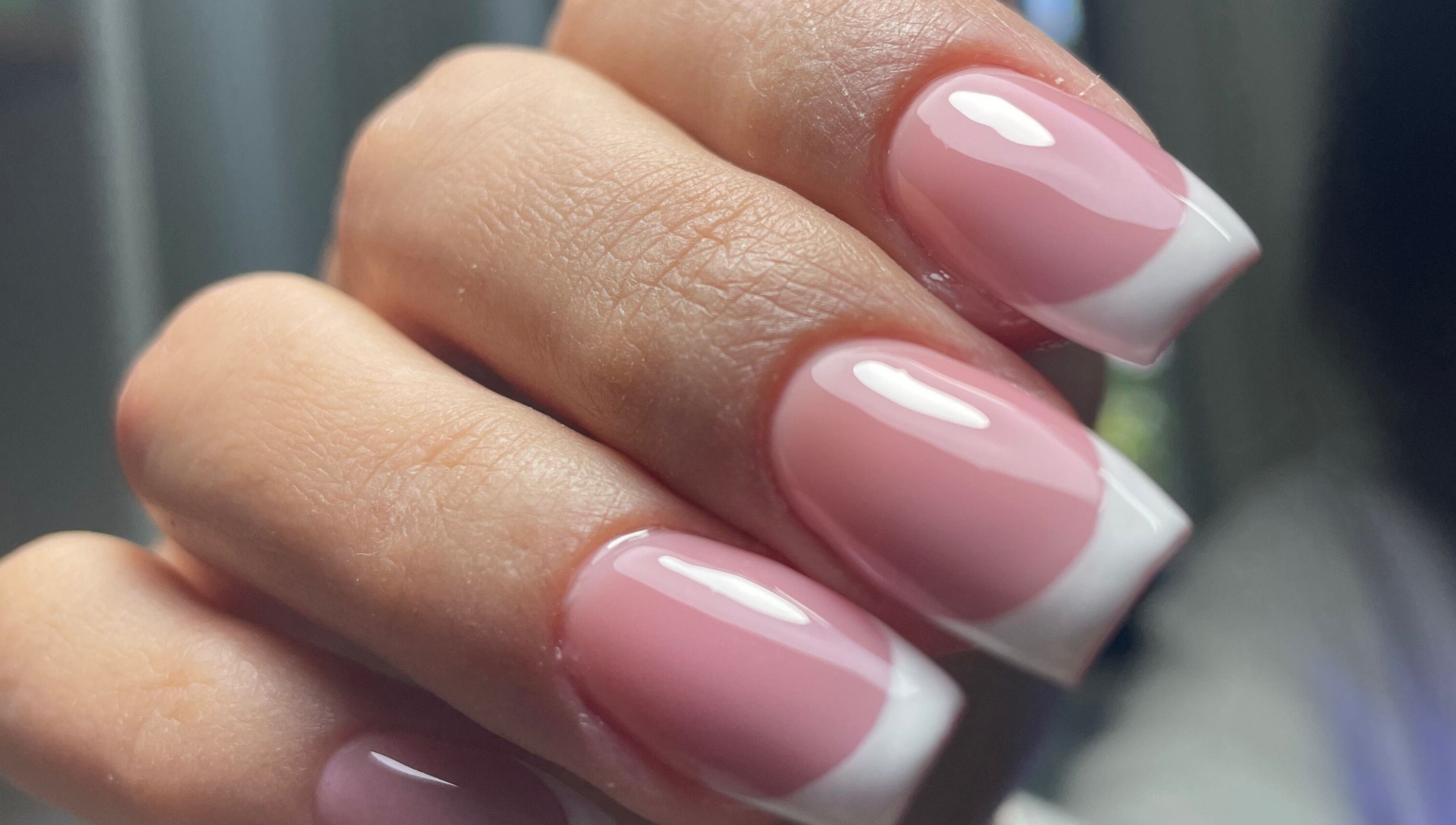 Elegant French manicure at Nails Eymen Güven, Muğla, Muğla, TR, showcasing glossy finish and soft pink tones.
