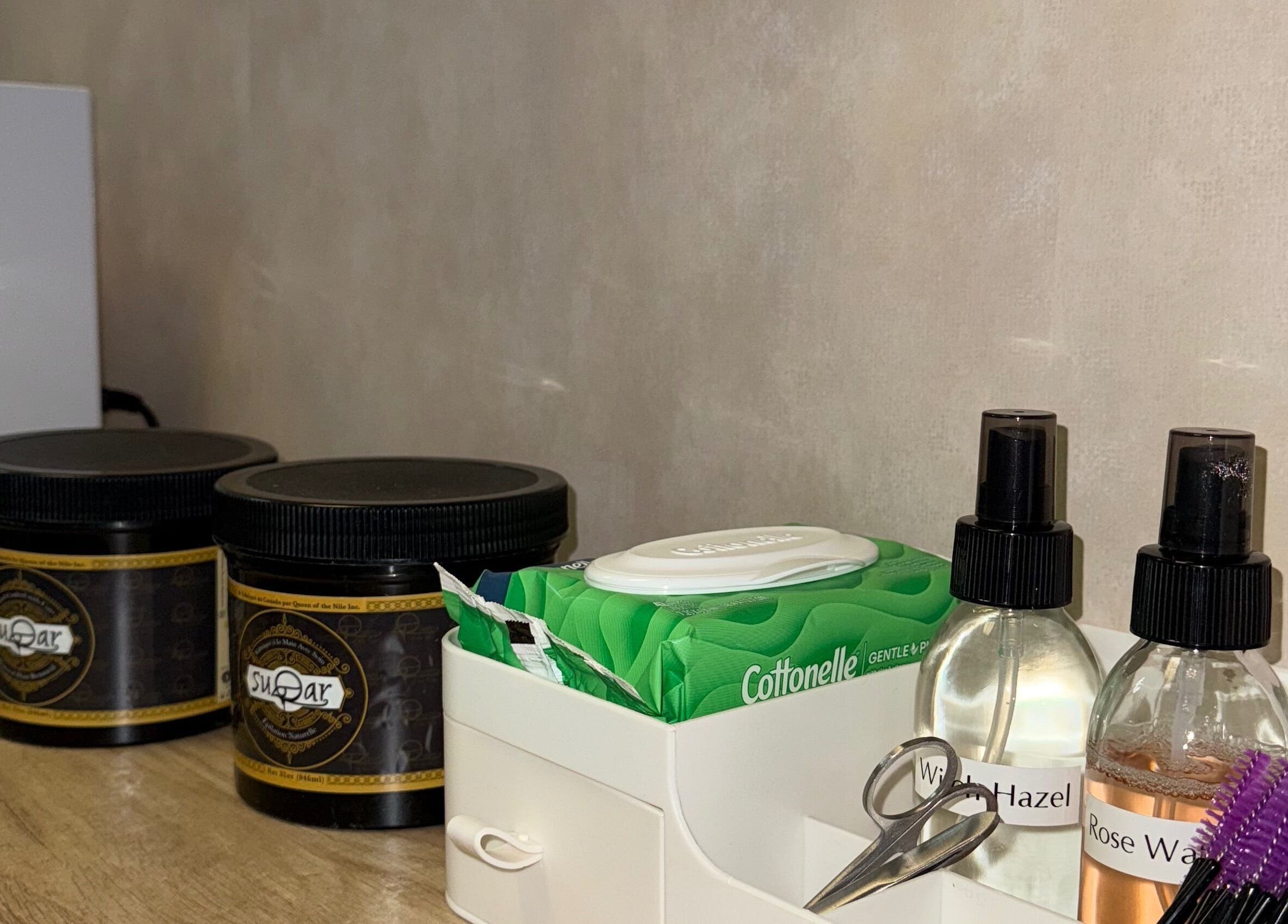 Beauty products at Skin Glow Studio x Sugar & Skin, London, Ontario, CA, showcasing skincare essentials.