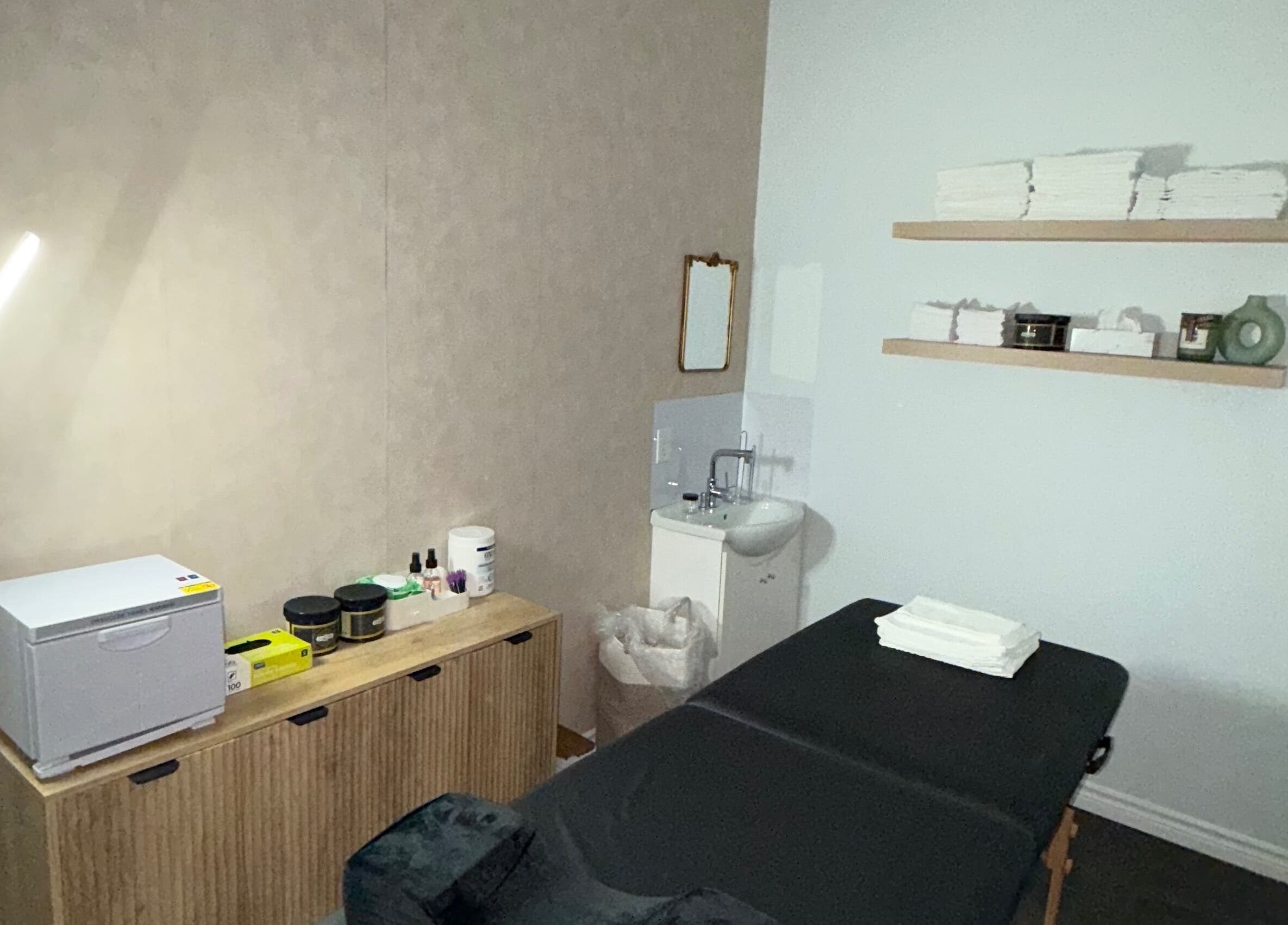 Tranquil treatment room at Skin Glow Studio x Sugar & Skin in London, Ontario, CA.