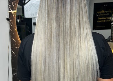Silky, long blonde hair makeover at American Barber Shop in Marinilla, Antioquia, CO.