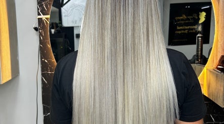 Silky, long blonde hair makeover at American Barber Shop in Marinilla, Antioquia, CO.