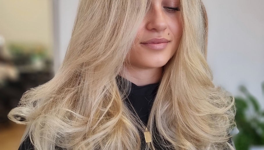Blonde hair styled in loose waves at The Styling Room, Devonport, Tasmania, AU.