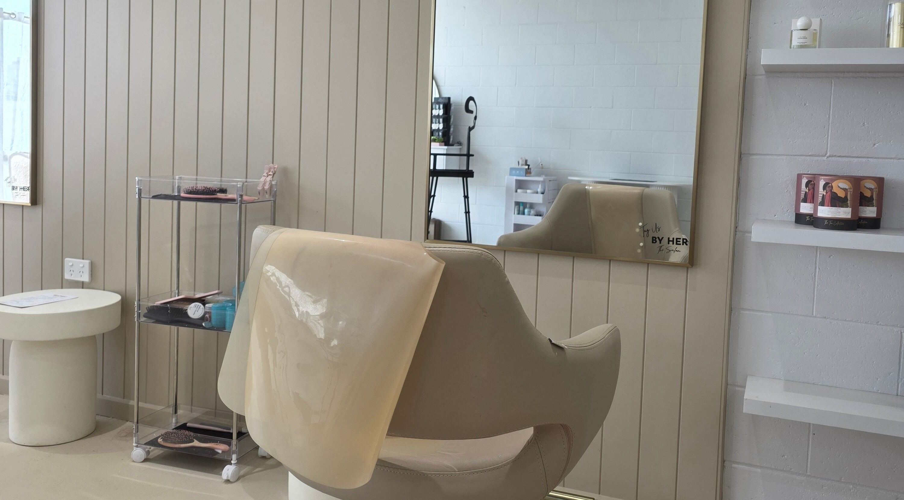 Elegant salon chair and mirror setup at The Styling Room, Devonport, Tasmania, AU, showcasing a chic ambiance.