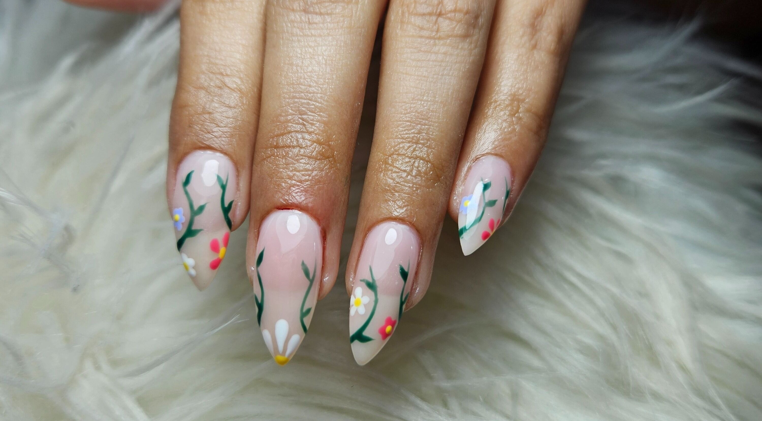 Elegant floral nail art at By Seah Nail & Tanning Boutique in Brooklyn Park, South Australia, AU.