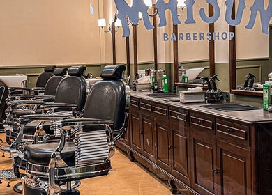Elegant barber chairs at Maison Barbershop, Bali, Bali, ID showcasing classic style and comfort.
