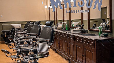 Elegant barber chairs at Maison Barbershop, Bali, Bali, ID showcasing classic style and comfort.
