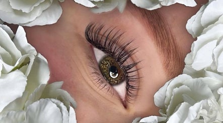 Close-up of elegant eyelash extension at Premier Beauty Clinic, Tallinn, Kesklinn, EE, surrounded by white petals.