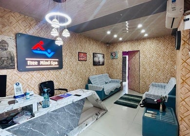 Reception area of Free Mind Spa in Jp Nagar, Karnataka, IN featuring modern décor and a serene ambiance.