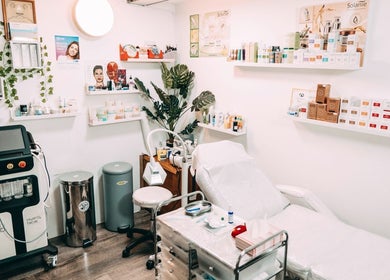 Serene treatment room at BALANCE AESTHETICS CARDIFF, Cardiff, Wales, GB showcasing equipment and skincare products.