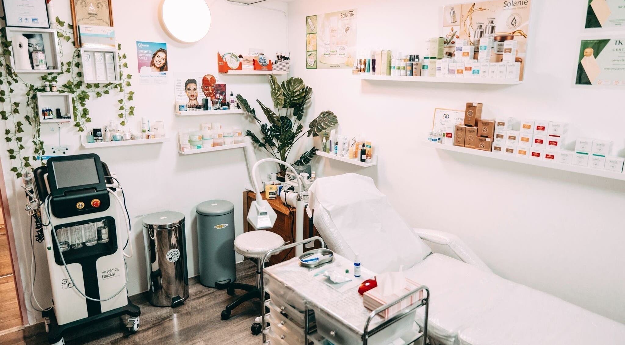 Serene treatment room at BALANCE AESTHETICS CARDIFF, Cardiff, Wales, GB showcasing equipment and skincare products.
