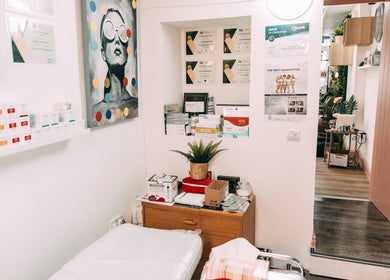 Treatment room at BALANCE AESTHETICS CARDIFF, Cardiff, Wales, GB, featuring modern decor and skincare products.