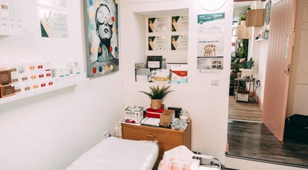 Treatment room at BALANCE AESTHETICS CARDIFF, Cardiff, Wales, GB, featuring modern decor and skincare products.
