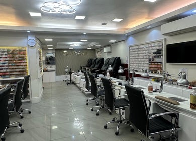 Usa Nails (Basingstoke) interior featuring modern manicure stations in Basingstoke, England, GB.