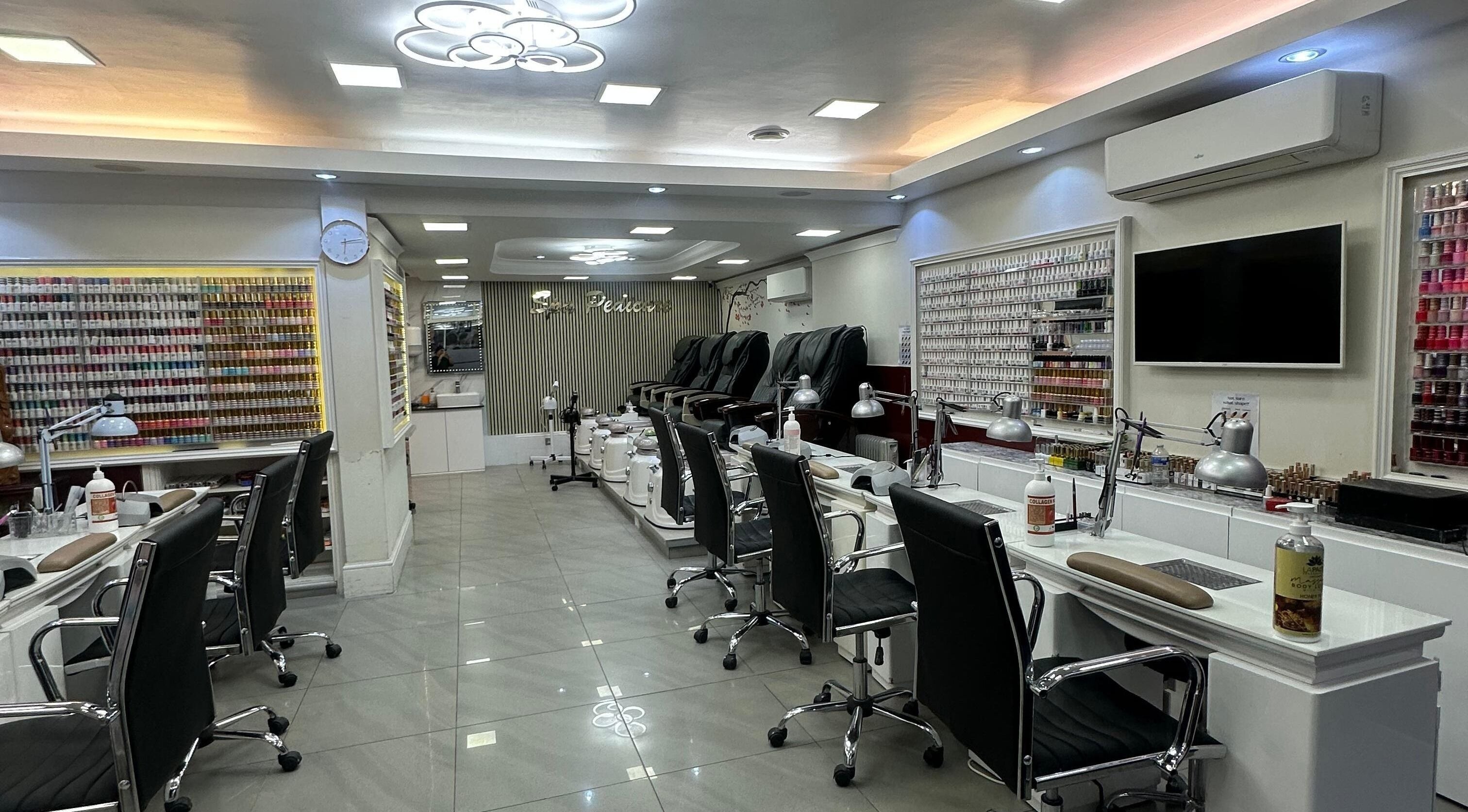Usa Nails (Basingstoke) interior featuring modern manicure stations in Basingstoke, England, GB.