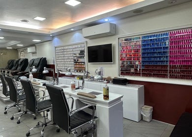 Usa Nails (Basingstoke) interior, showcasing manicure stations in Basingstoke, England, GB.