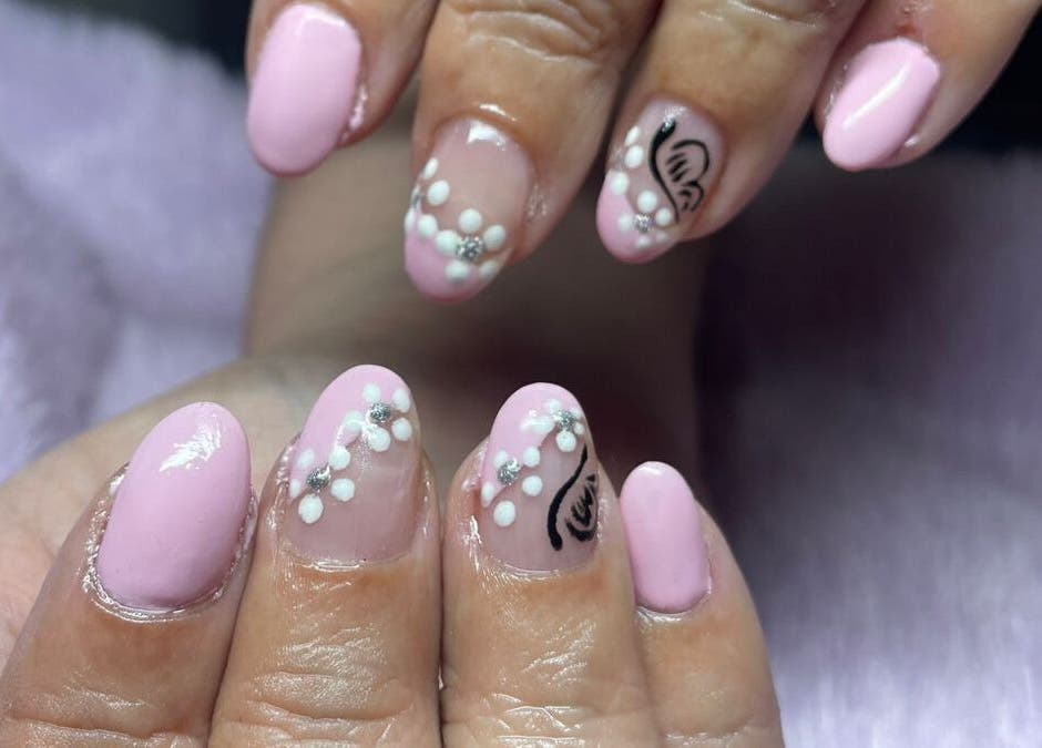 Elegant pink floral nail art at SassyNailsbyAnezane in Pretoria, Gauteng, ZA.