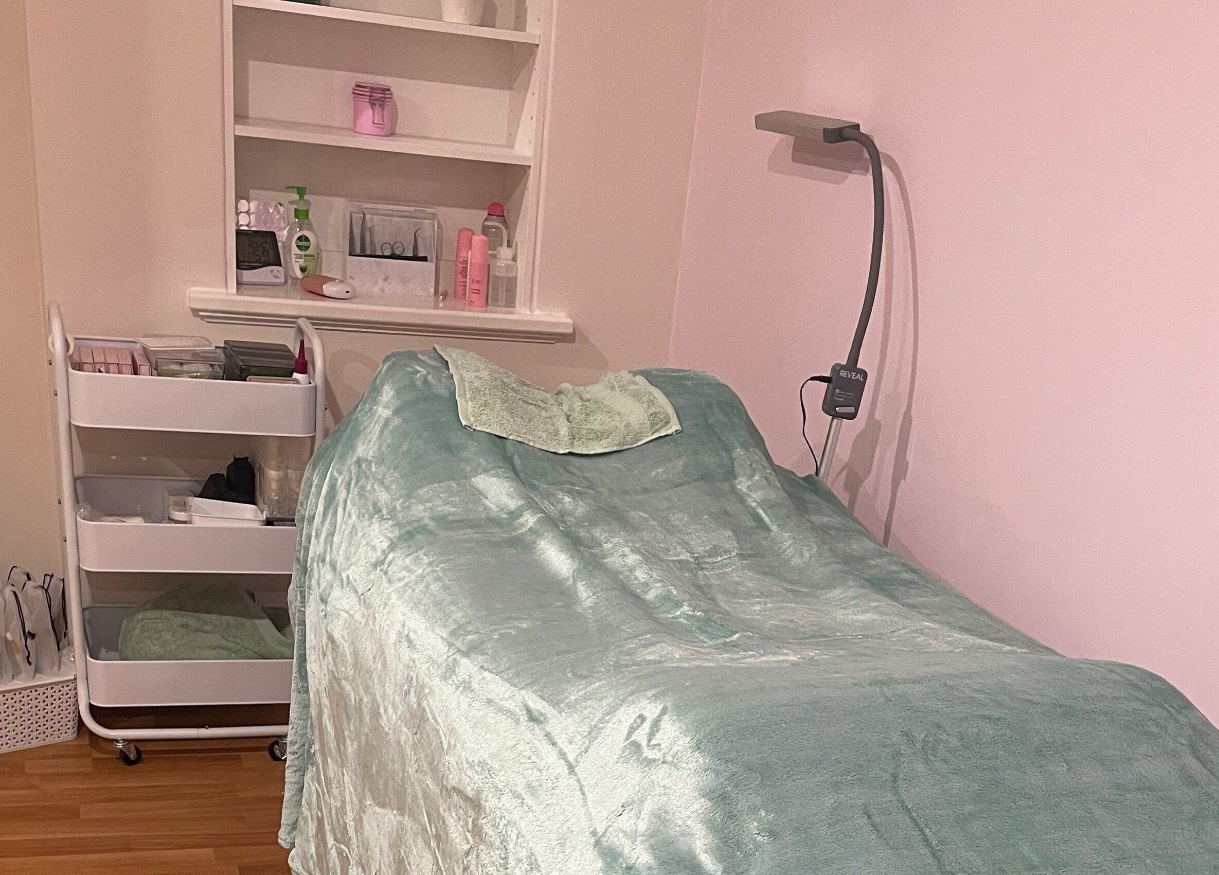 Relaxing treatment room at EverBloom Studio, Sinagra, Western Australia featuring a tranquil bed and essentials.