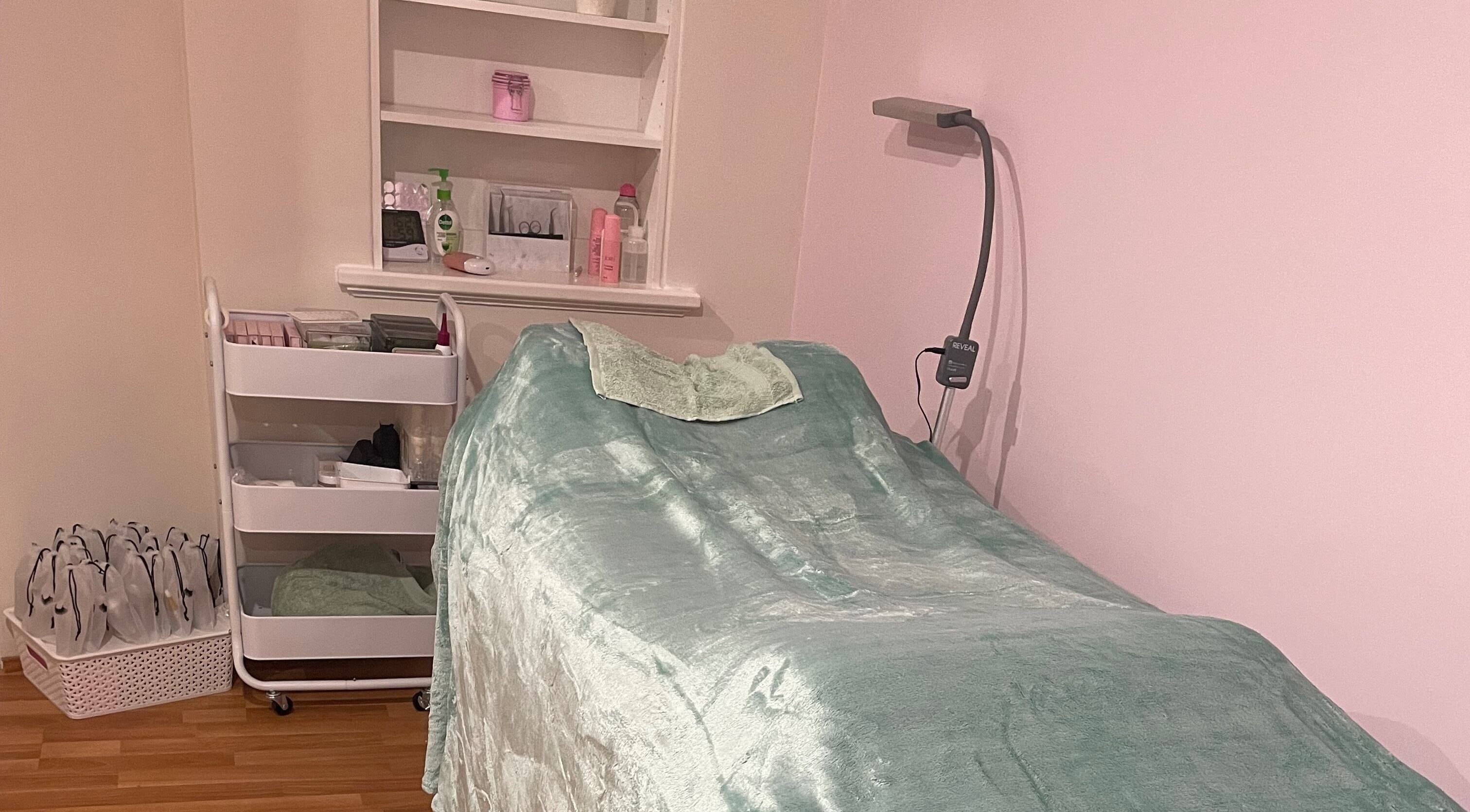 Relaxing treatment room at EverBloom Studio, Sinagra, Western Australia featuring a tranquil bed and essentials.