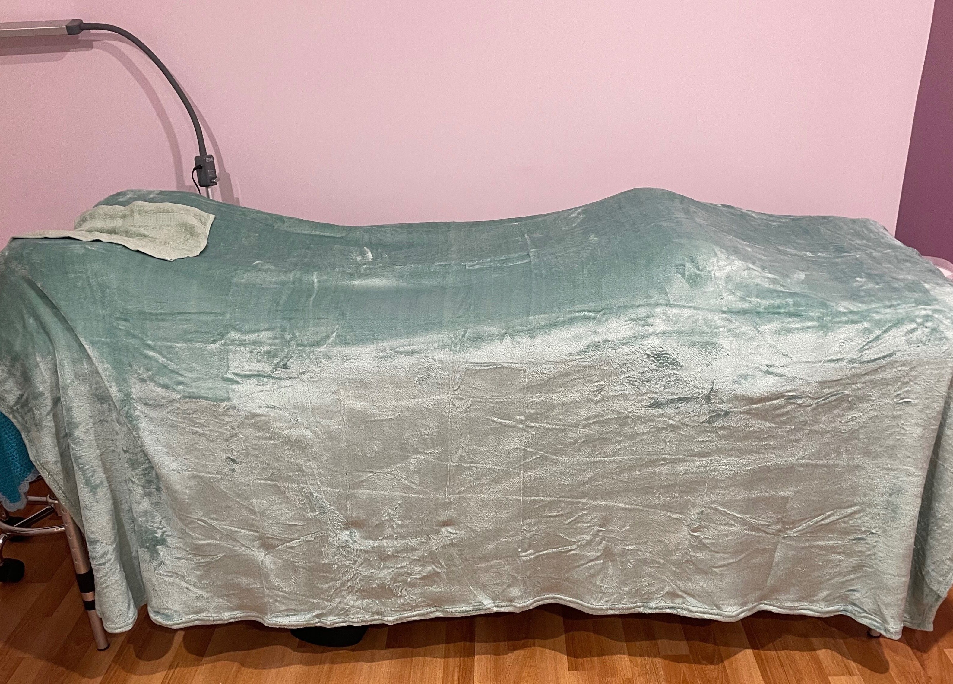 Relaxing treatment table at EverBloom Studio, Sinagra, Western Australia, AU for ultimate wellness experience.