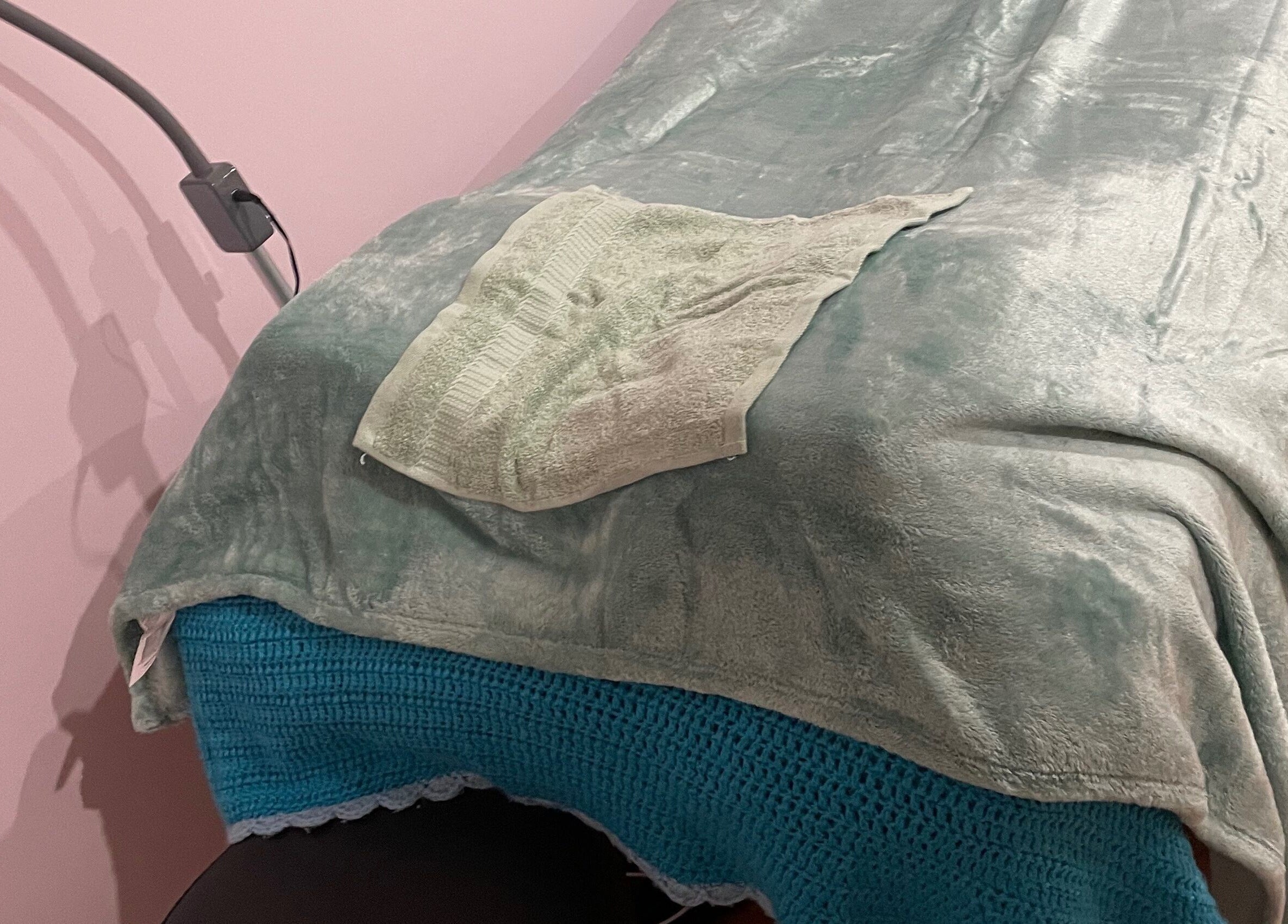 Comfortable spa bed with soft linens at EverBloom Studio, Sinagra, Western Australia, AU.