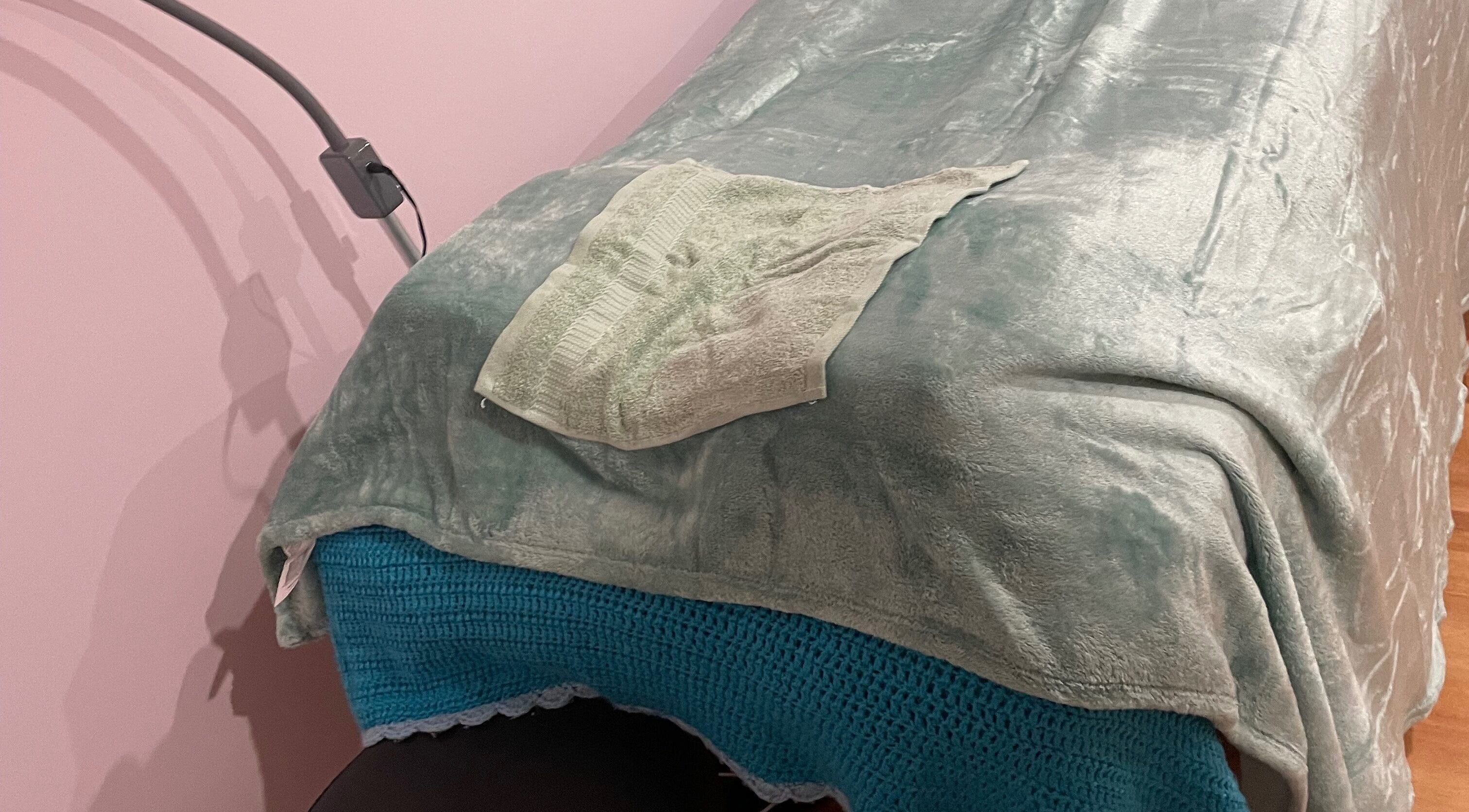 Comfortable spa bed with soft linens at EverBloom Studio, Sinagra, Western Australia, AU.