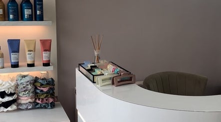 Reception at Sophia The Hairstylist, Ipswich, England with hair products and decor.