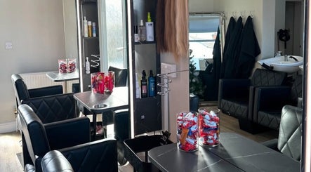 Sophia The Hairstylist venue in Ipswich, England, showcasing elegant salon interior with black chairs.