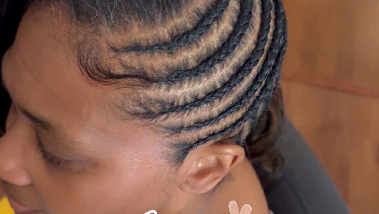 Detailed cornrow hairstyle at Aka’s Anointed Hands in Columbia, South Carolina, US.