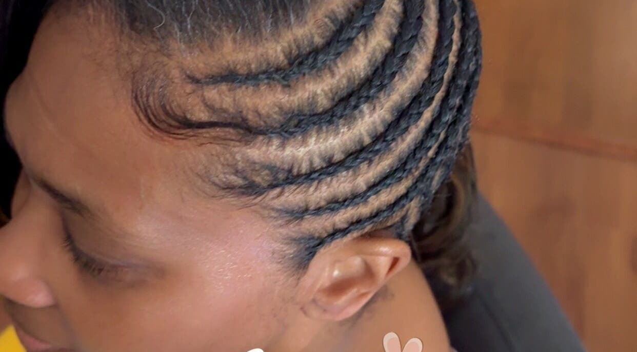 Detailed cornrow hairstyle at Aka’s Anointed Hands in Columbia, South Carolina, US.