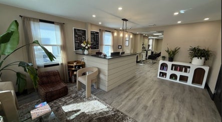Brunetto Beauty's elegant reception area in Oakland, New Jersey, US, featuring modern decor and a welcoming atmosphere.