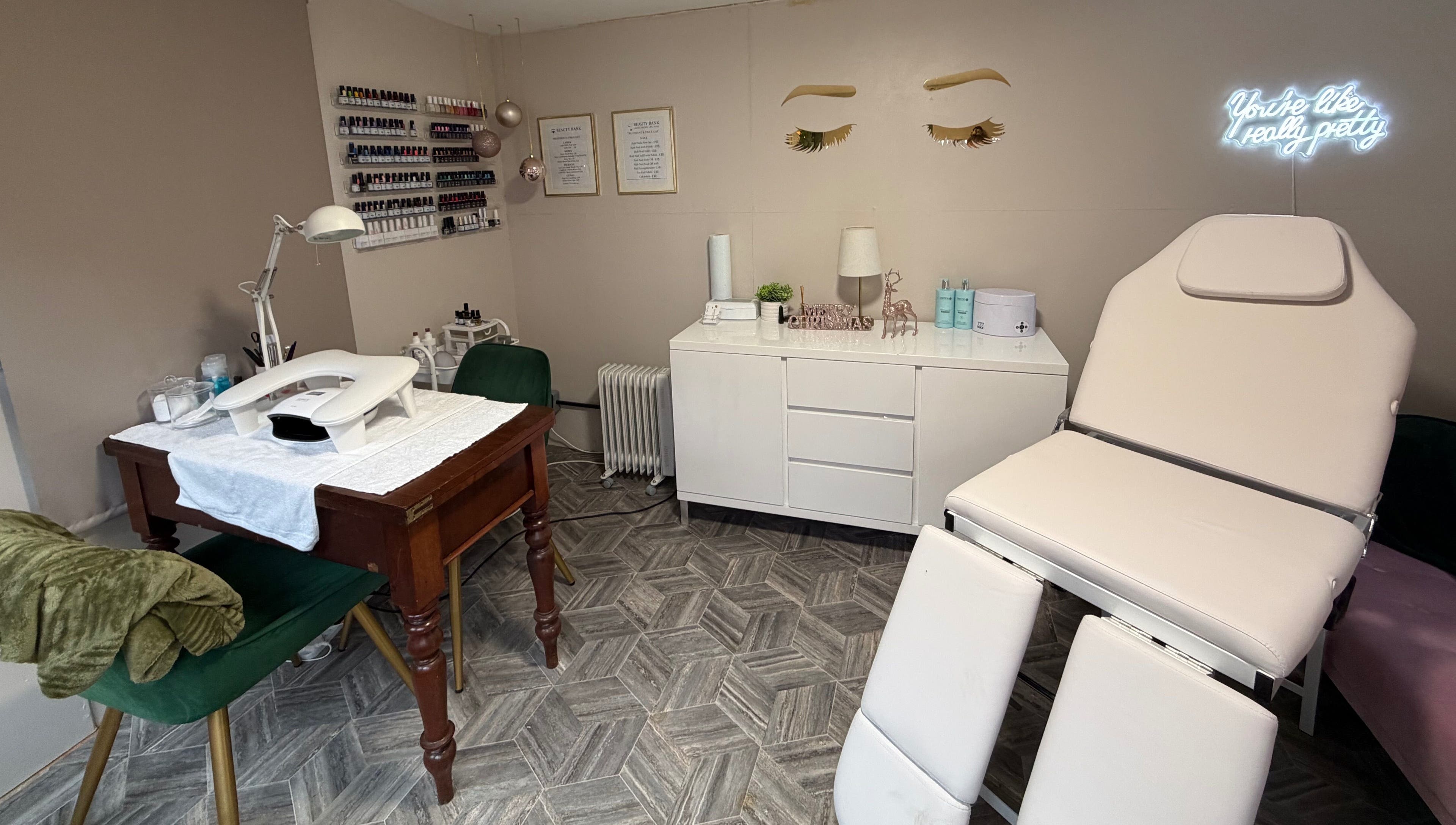 Beauty Bank's modern treatment room in Clitheroe, England, GB with nail station and reclining chair.