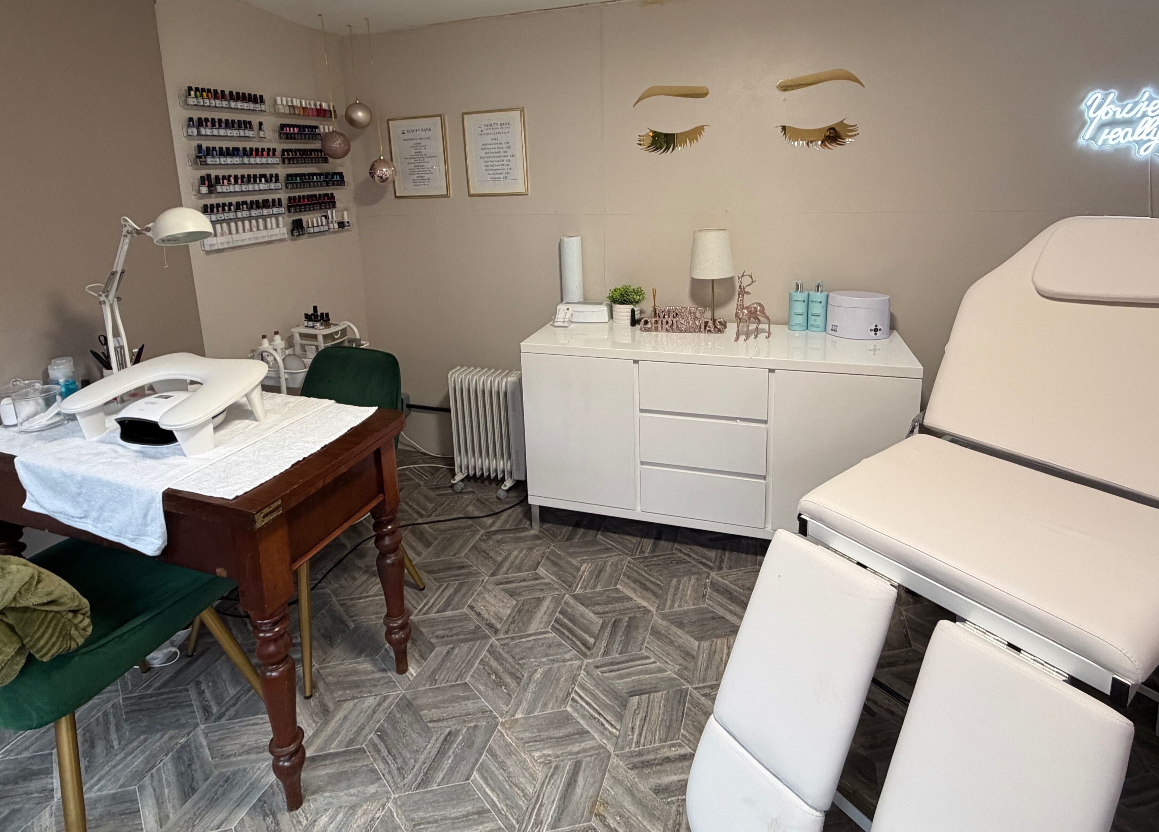 Beauty Bank's modern treatment room in Clitheroe, England, GB with nail station and reclining chair.