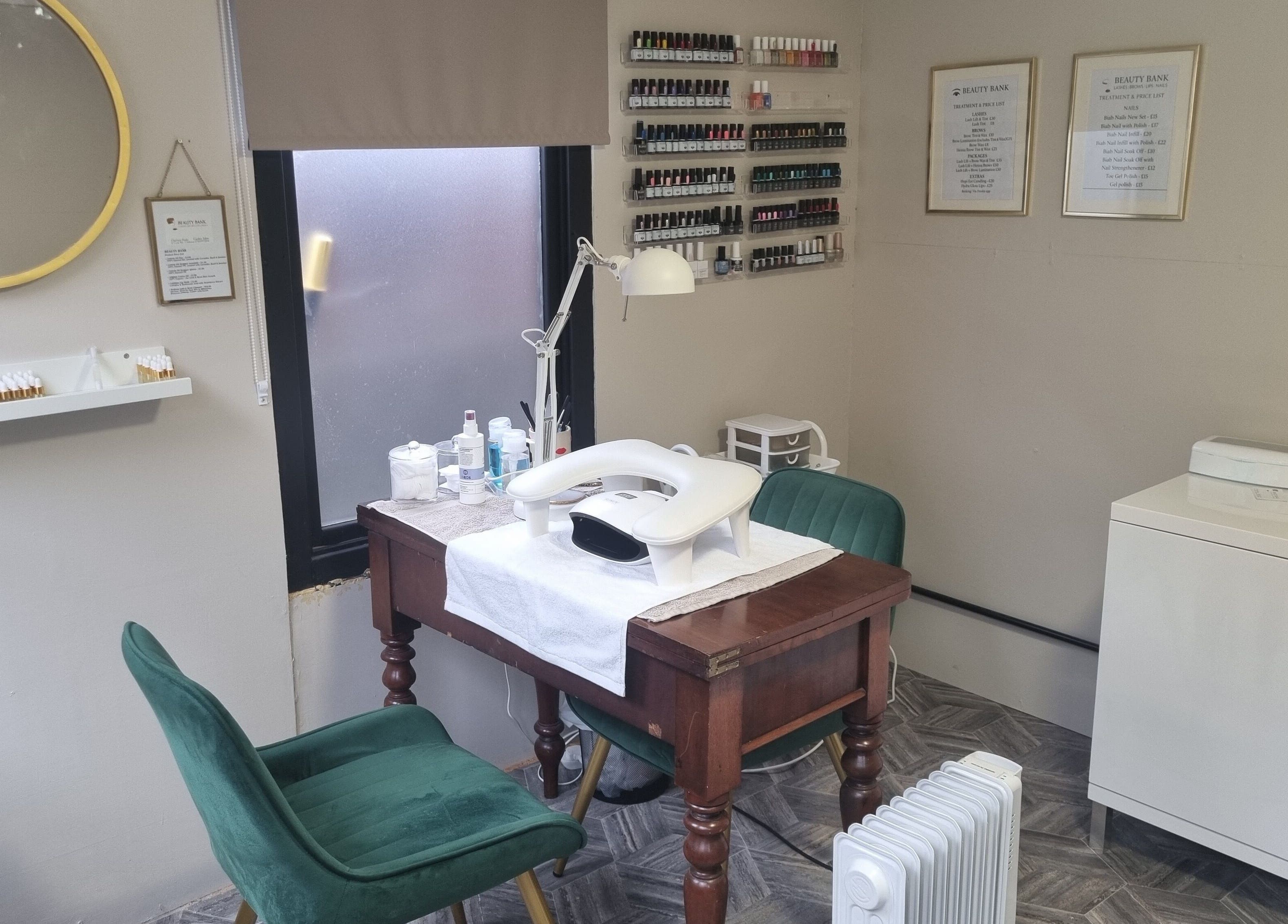 Cozy nail salon at Beauty Bank, Clitheroe, England, featuring elegant decor and manicure setup.