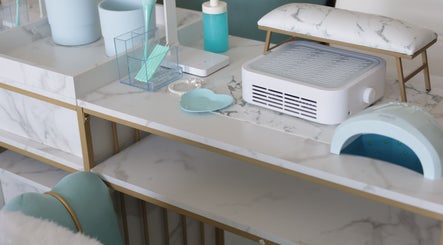 Elegant nail station setup at Shadi Nails, Conoga Park, California, US with modern tools and decor.