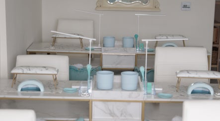 Luxurious nail stations at Shadi Nails in Conoga Park, California, US, featuring stylish white and blue decor.