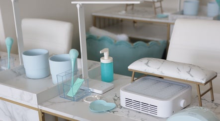 Elegant nail station setup at Shadi Nails, Conoga Park, California, US, featuring modern tools and decor.