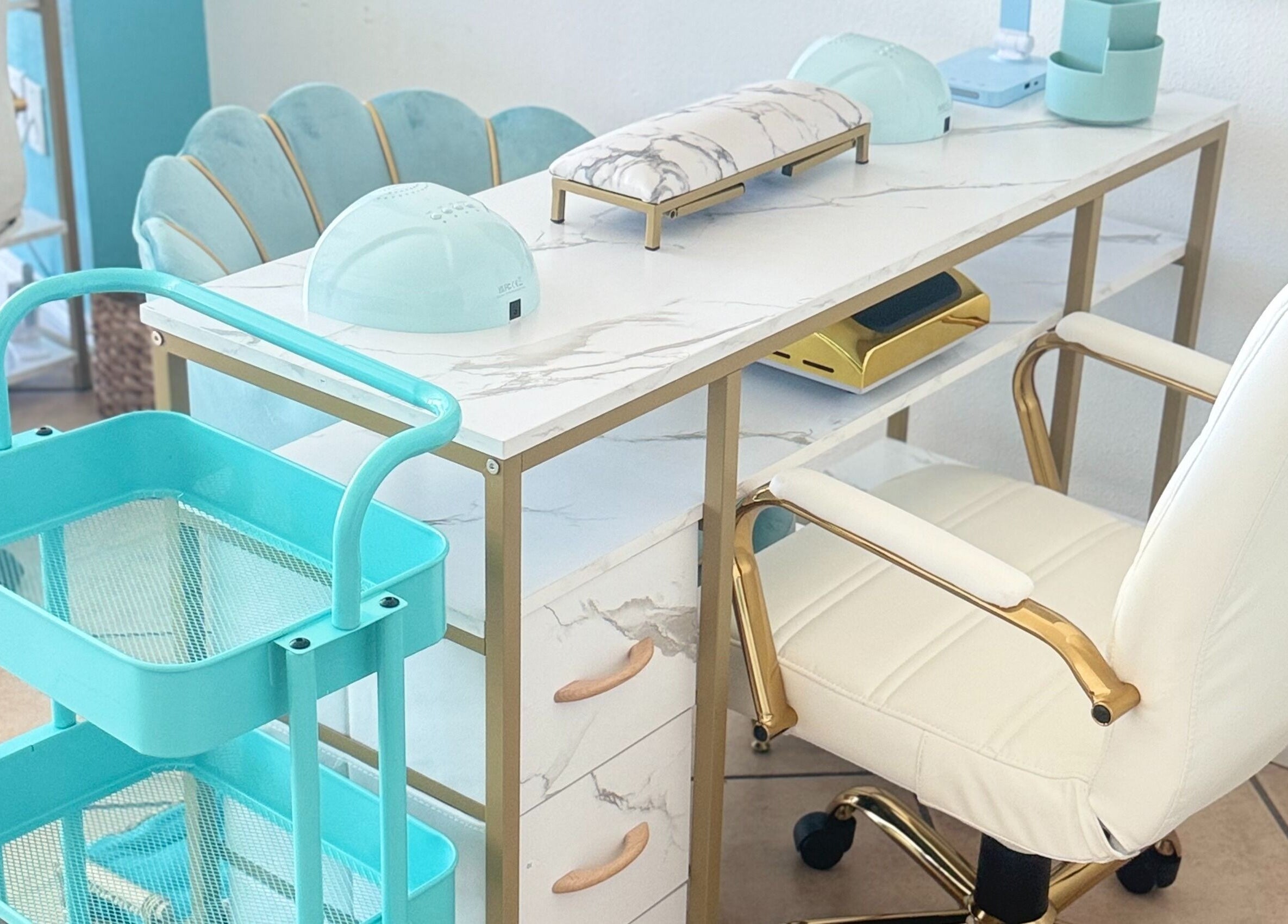 Elegant nail station setup at Shadi Nails, Encino, California, US with sleek decor and comfortable seating.