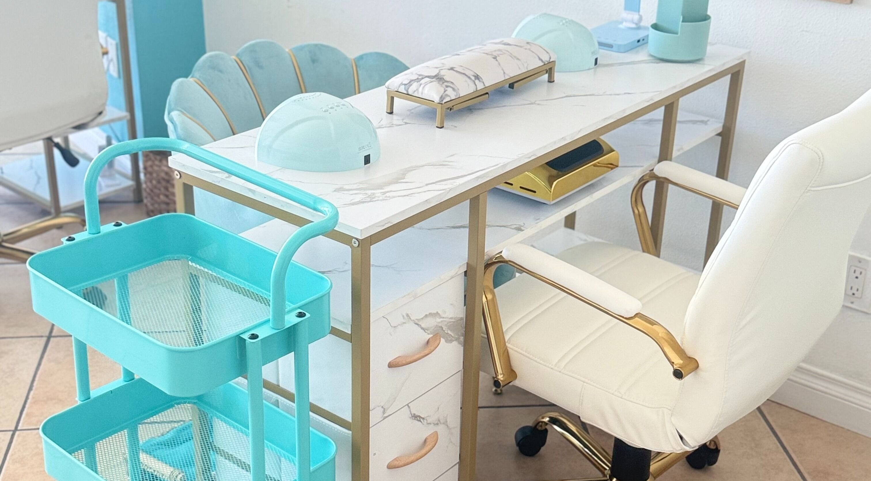 Elegant nail station setup at Shadi Nails, Encino, California, US with sleek decor and comfortable seating.