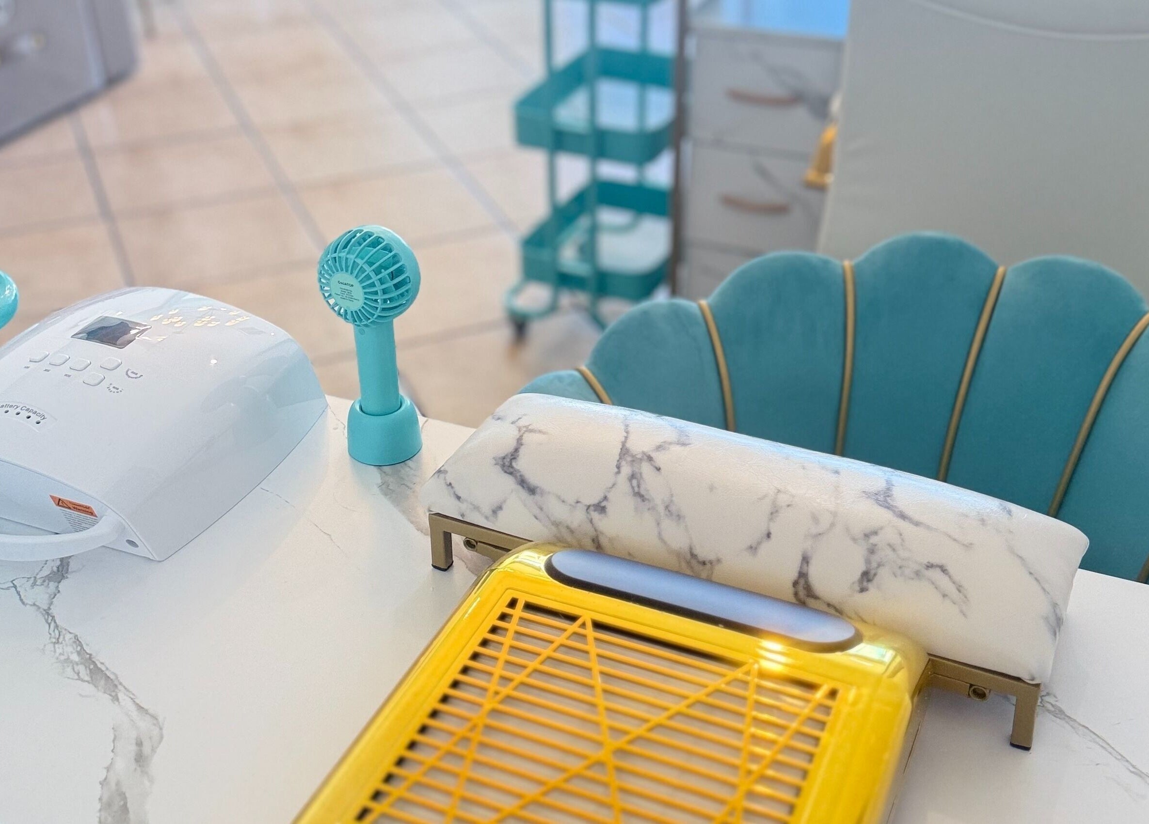 Nail station at Shadi Nails, Encino, California, US with modern decor and tools for a relaxing experience.