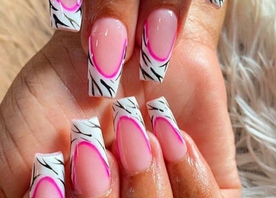 Stylish pink and black nail art at Friendly Salon, Soshanguve, Gauteng, ZA.