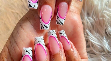 Stylish pink and black nail art at Friendly Salon, Soshanguve, Gauteng, ZA.