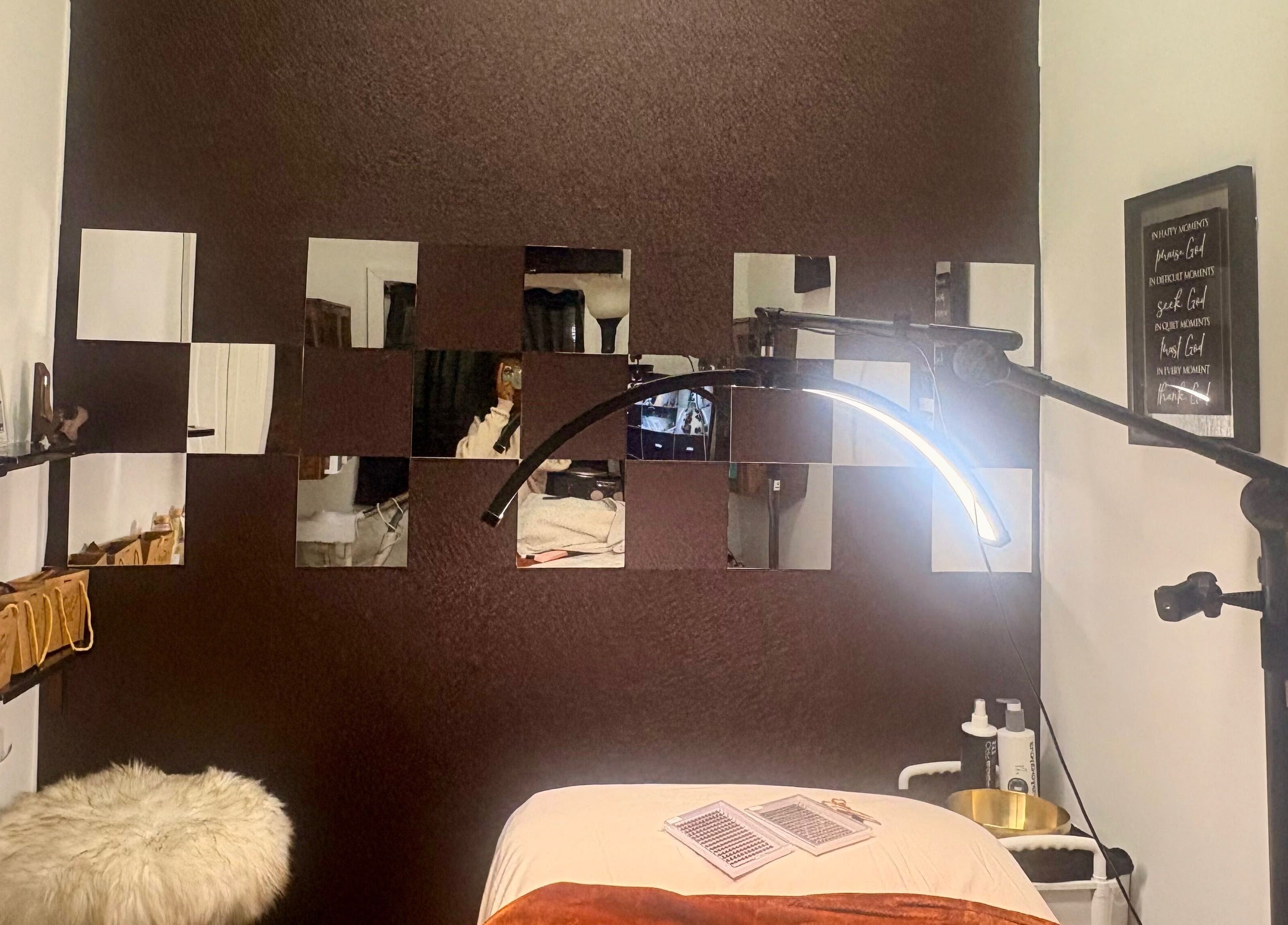 Elegant treatment room at Noire Naturels Aesthetics, Dallas, Texas, US, featuring modern decor and soothing lighting.