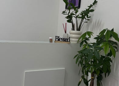 Calming corner with plants and decor at Exotic Lash and Brow Studio, Durban, Kwazulu-natal, ZA.