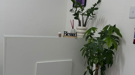Calming corner with plants and decor at Exotic Lash and Brow Studio, Durban, Kwazulu-natal, ZA.