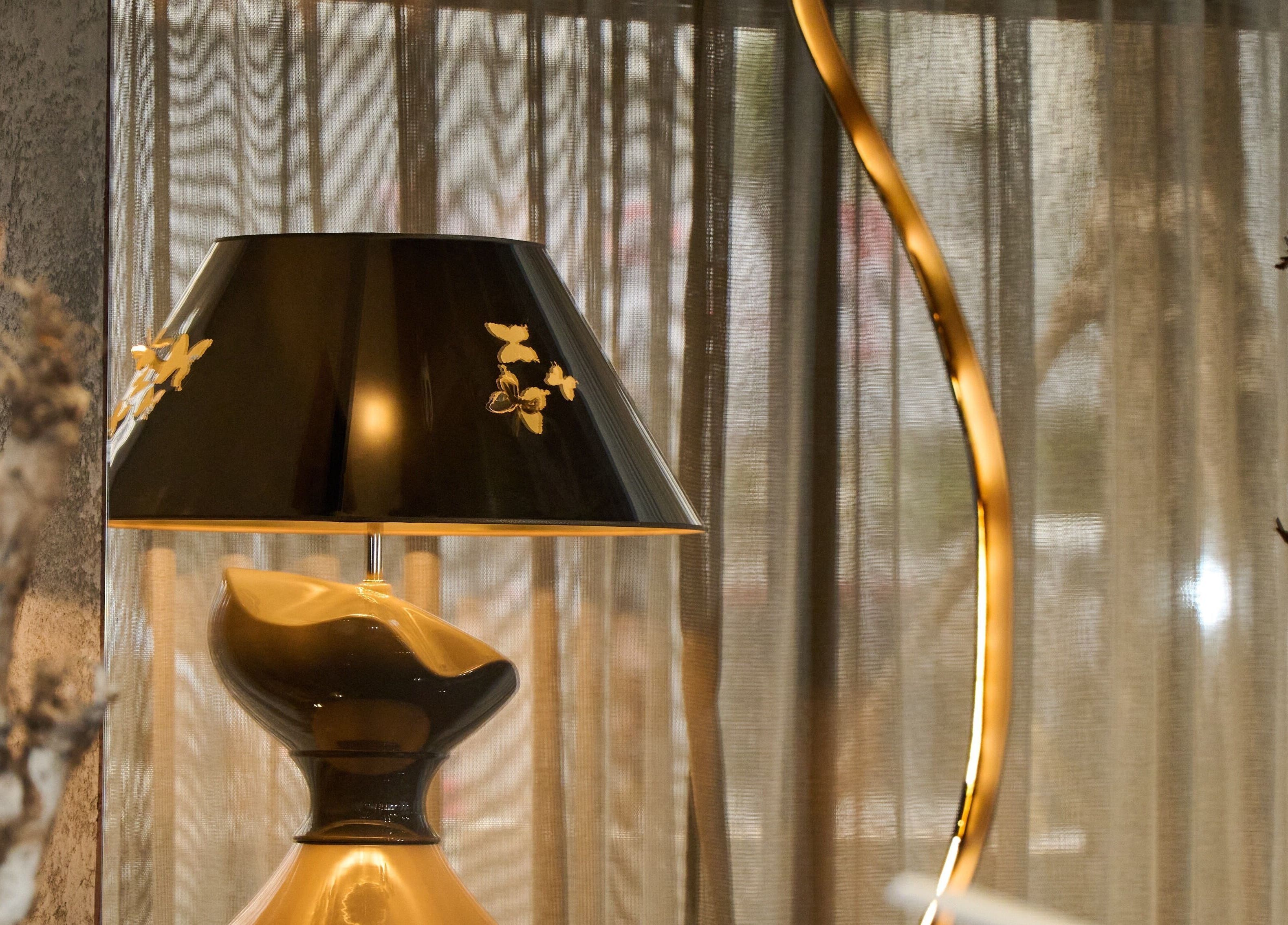 Sophisticated black and gold lamp at Lalo Beauty, Casablanca, Casablanca-settat, MA, enhancing ambiance.