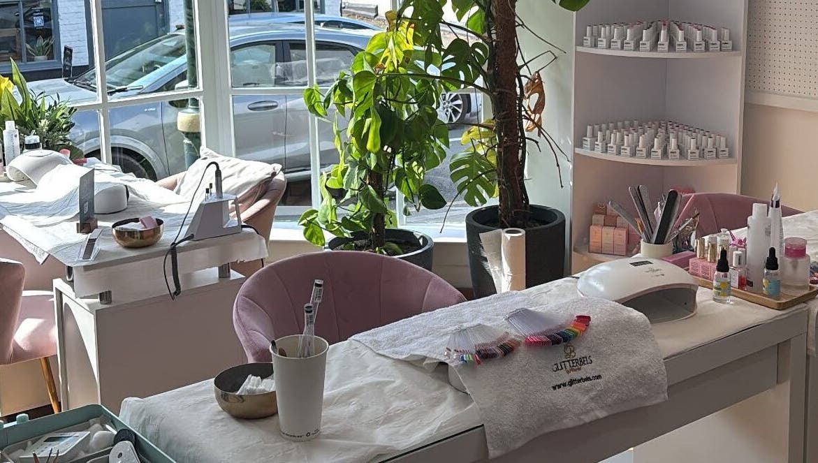 Bright nail salon setup at Glow Up With Molly in Wheathampstead, England, GB, showcasing manicure essentials.
